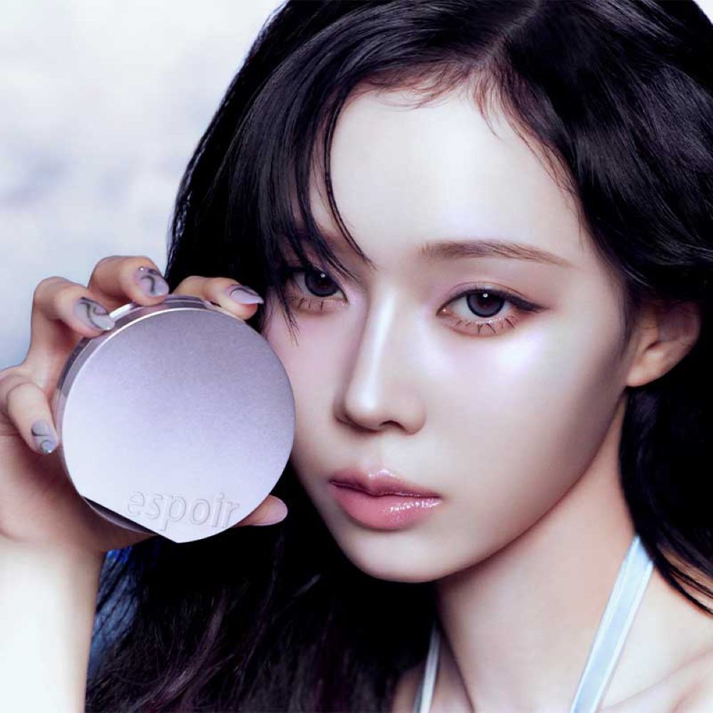 ESPOIR New Galaxy Edition Cushion / Highlither / Lipstick / Lip balm showcased by a model with striking makeup.