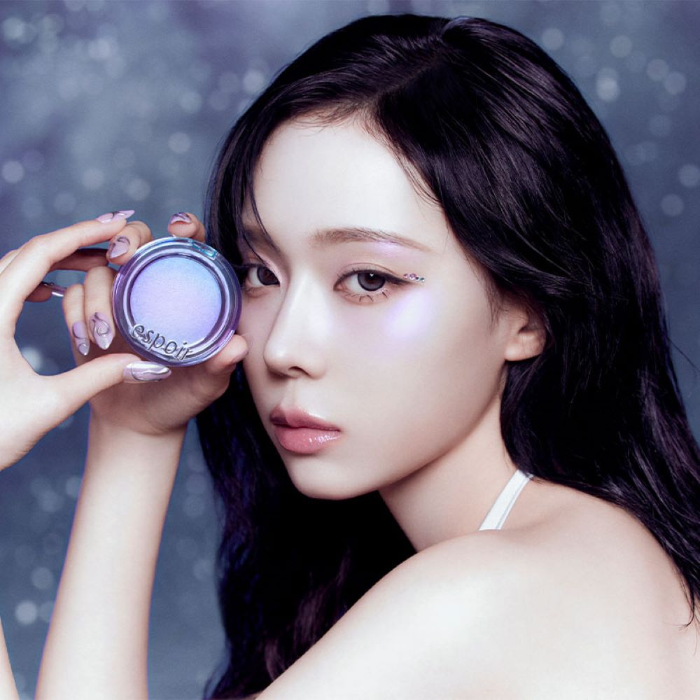 ESPOIR New Galaxy Edition Cushion / Highlither / Lipstick / Lip balm displayed on model with radiant makeup.