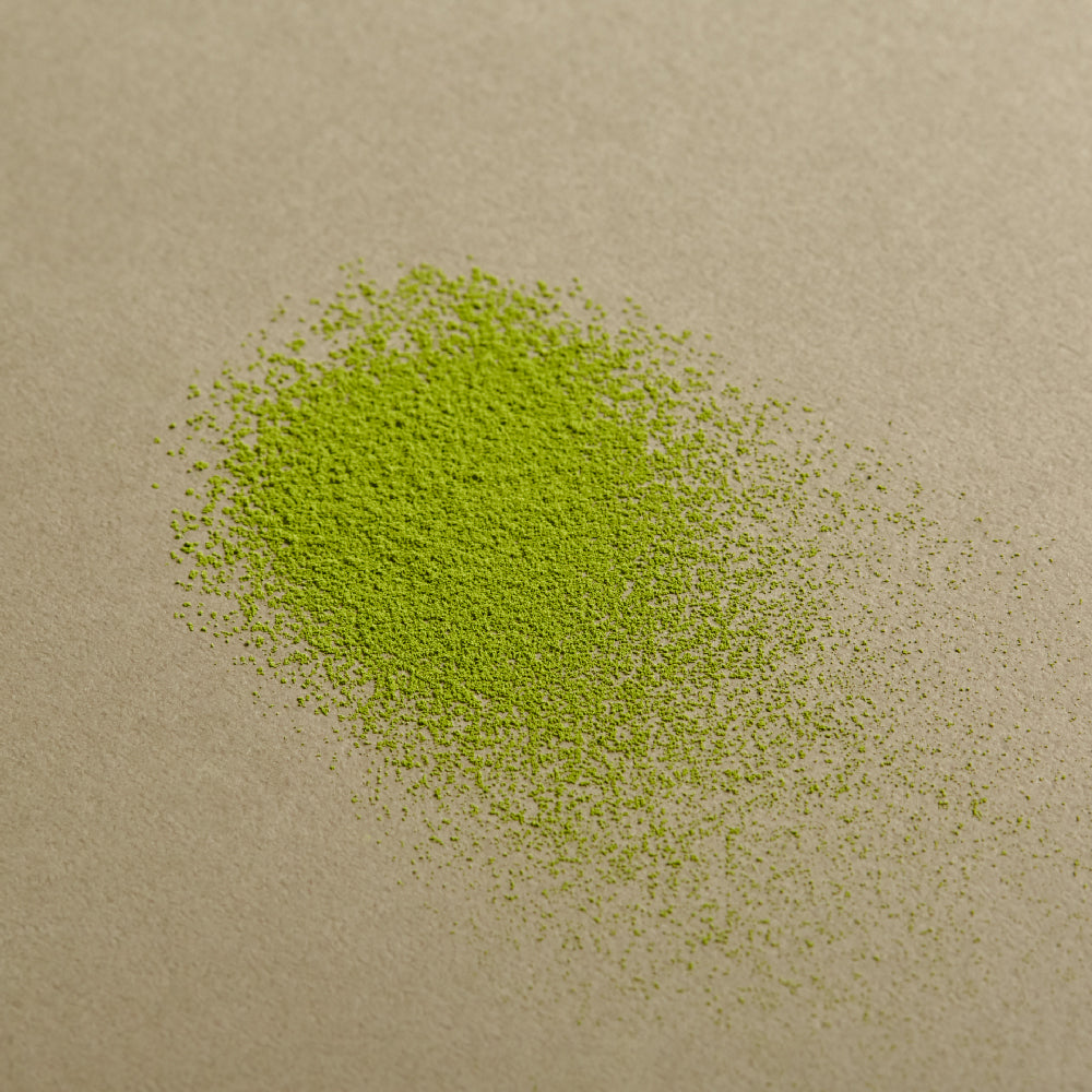 Osulloc Matcah Mania Bundle featuring vibrant green matcha powder spread on a surface.